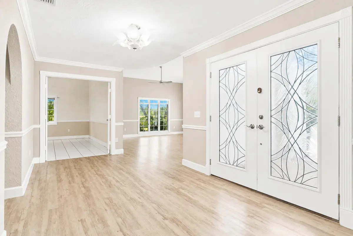 foyer with view of formal living room & at 1157 SW Mirror Lake Cove, Port St. Lucie