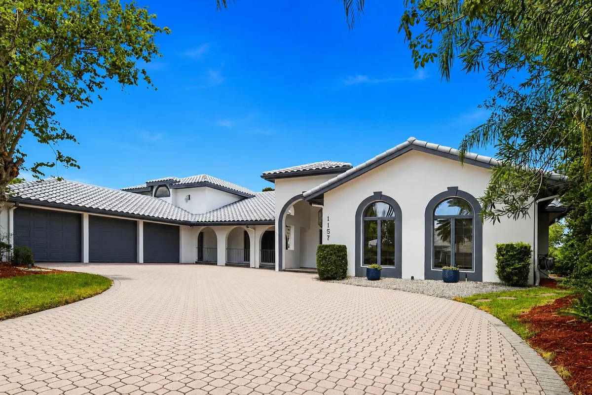 front of home at 1157 SW Mirror Lake Cove, Port St. Lucie