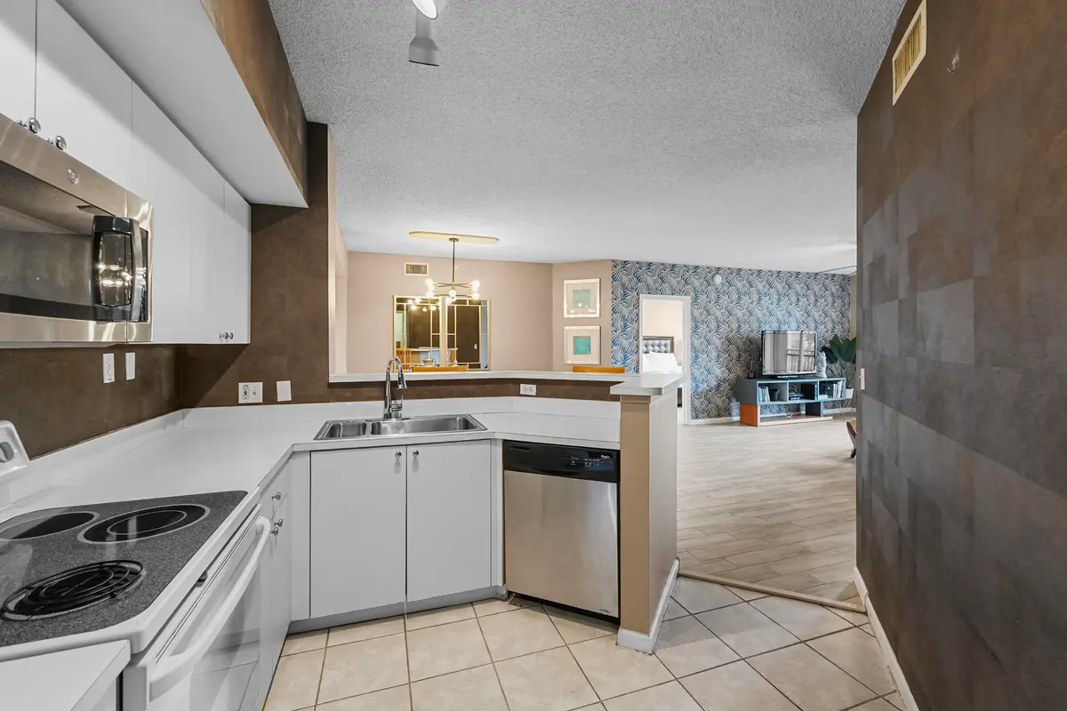 Kitchen at 11750 Saint Andrews Place 203, Wellington
