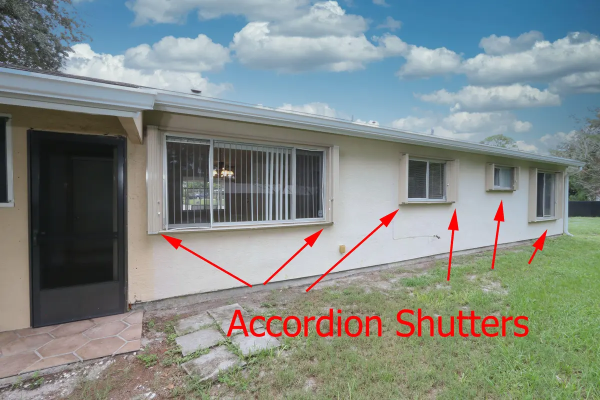 Accordian Shutters Throughout at 400 SW RUFFNER Court, Port St. Lucie