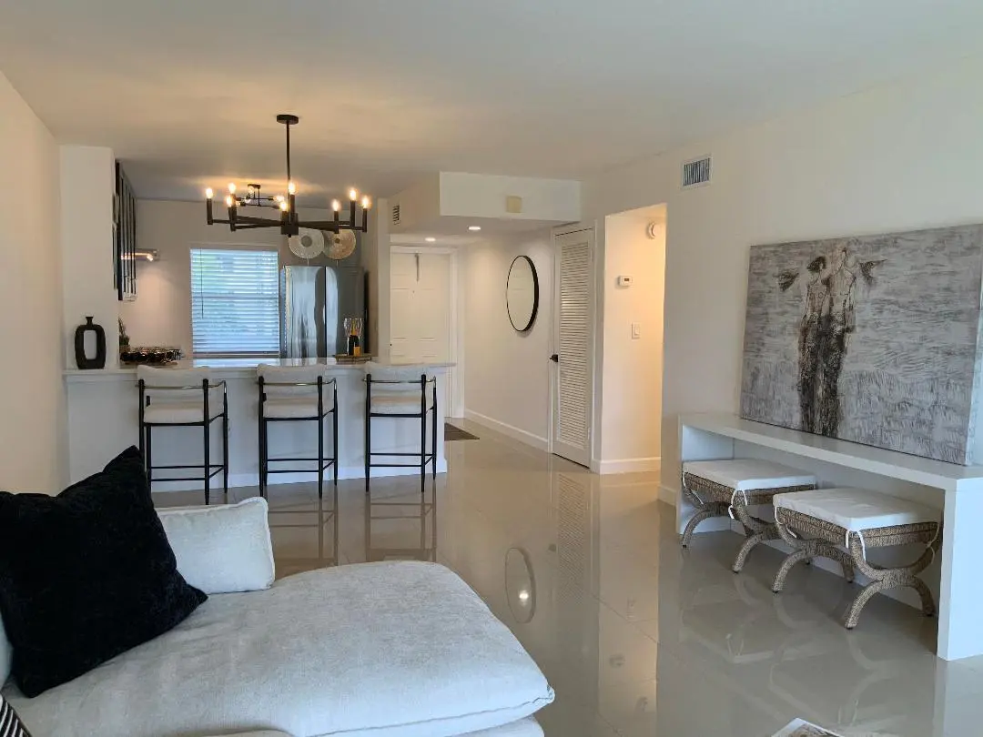 MLS living to kitchen at 9856 Marina Boulevard 1320, Boca Raton