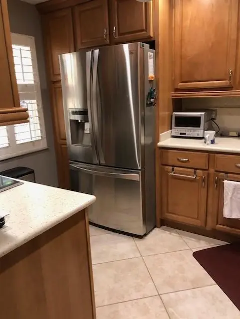 Kitchen view at 3980 Oaks Clubhouse Drive 101, Pompano Beach