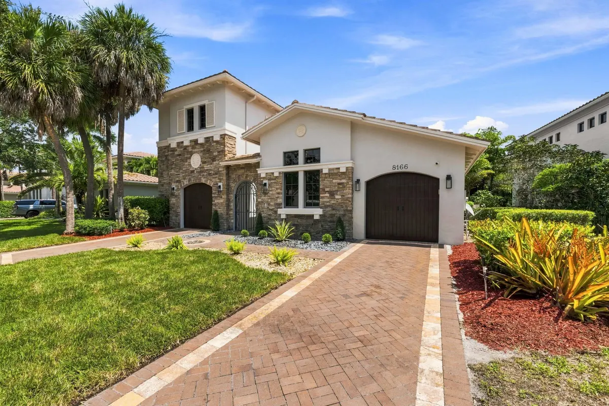 Front Exterior + Fresh Landscaping at 8166 Emerald Avenue, Parkland