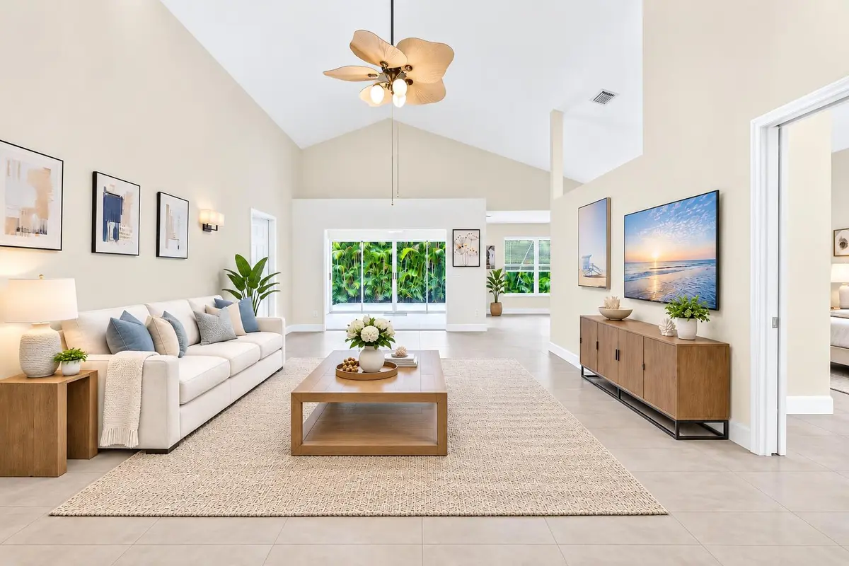 living room-virtual staged at 6193 SE WINDSONG Lane, Stuart