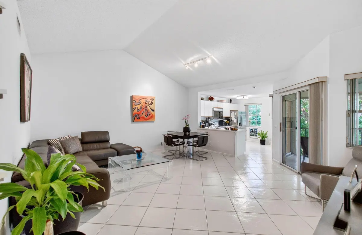LIVING ROOM WITH VAULTED CEILINGS at 6737 Via Regina, Boca Raton
