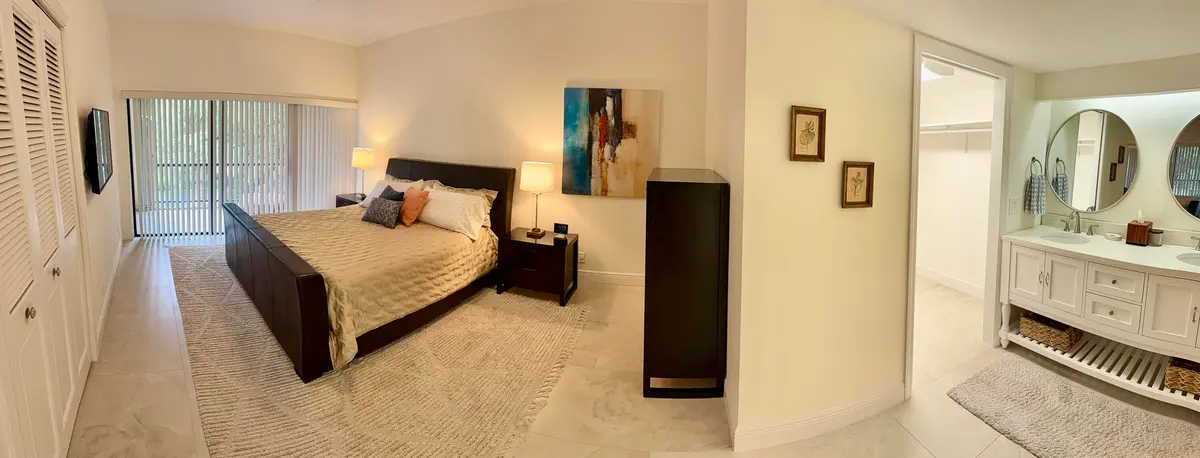 primary bedroom/bath at 1640 Twelve Oaks Way 305, North Palm Beach