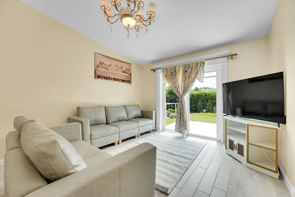 family room at 5715 SE Pine Avenue, Stuart