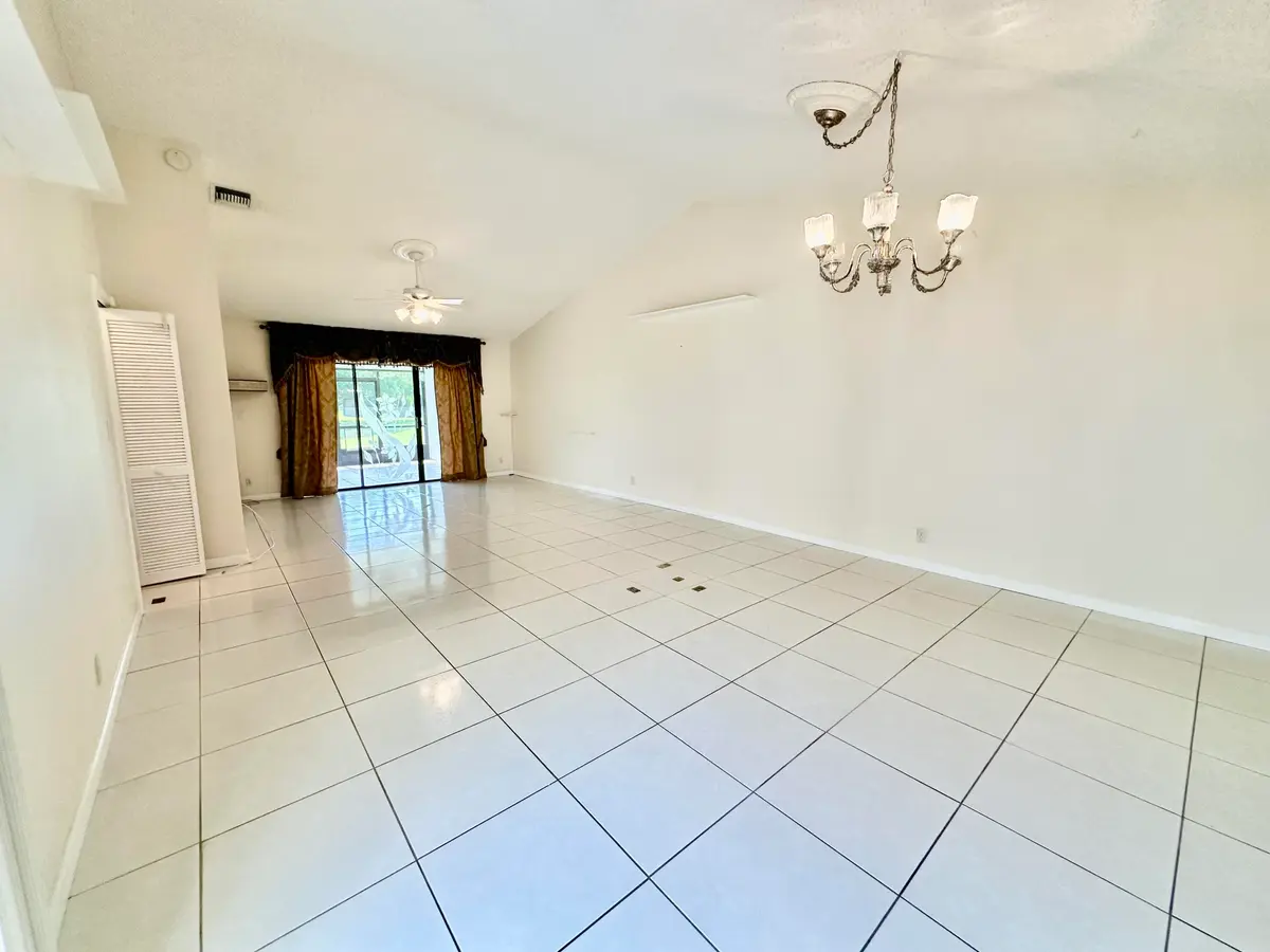 Living and Dining Room at 305 Lakeside Court, Sunrise