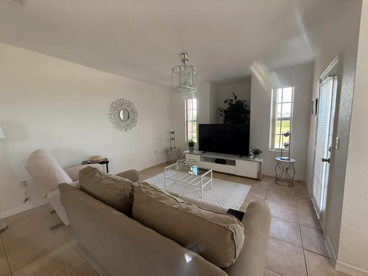 living room at 156 SW Peacock Boulevard 29-202, Port St. Lucie