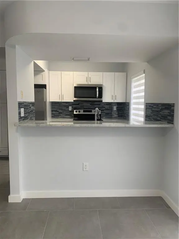 Photo 4 at 103 Riviera Circle, Weston