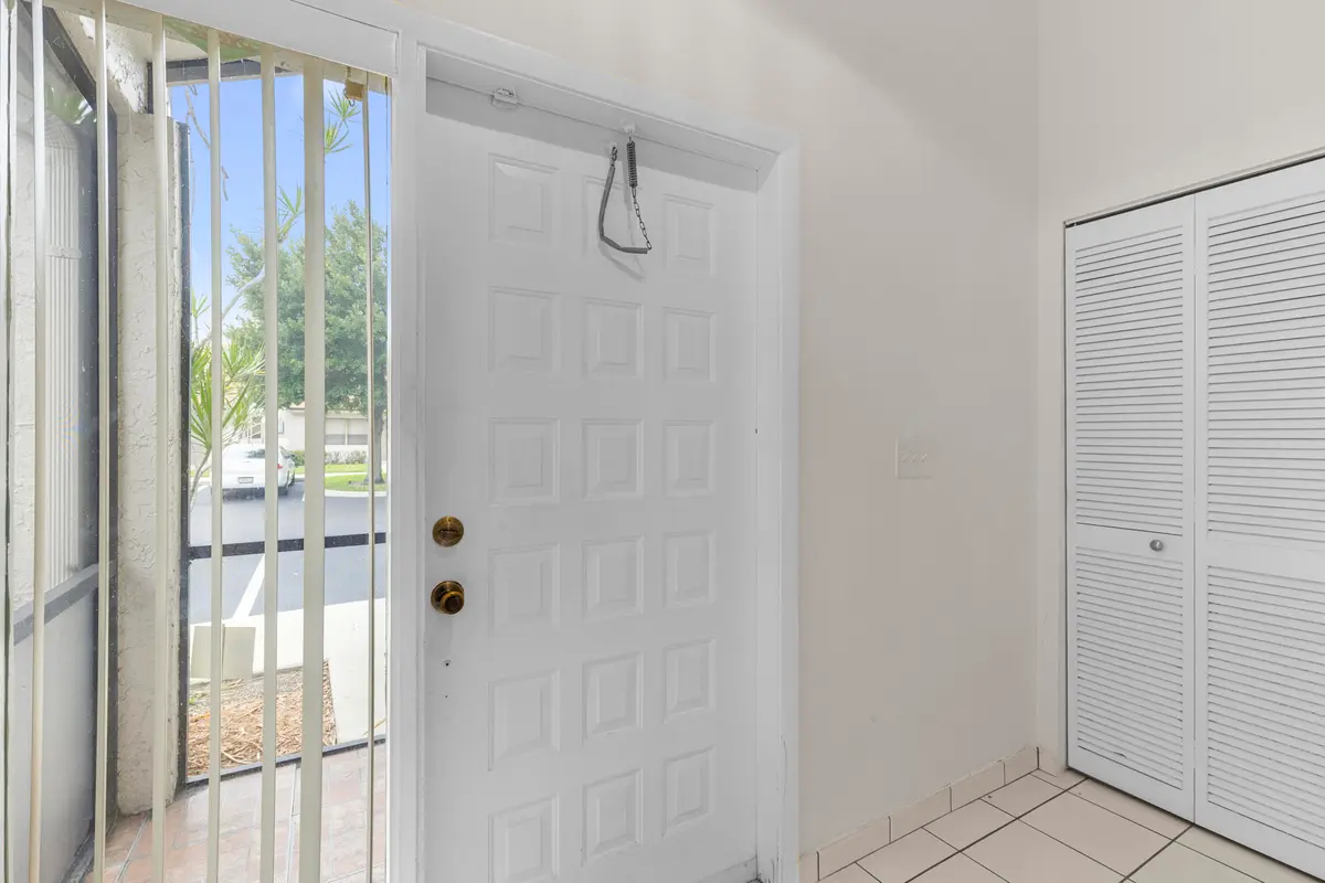 Entry foyer w_scrnd front at 1001 NW 79th Avenue, Plantation