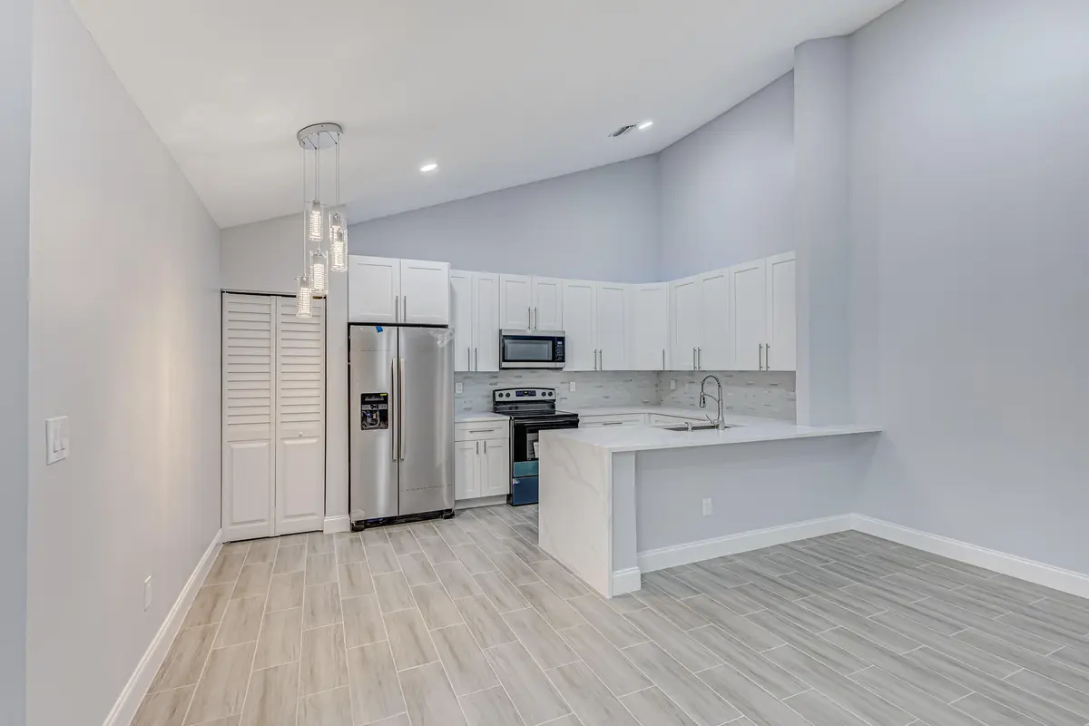 Dining area & Kitchen at 1240 SUMMIT PLACE Circle D, West Palm Beach