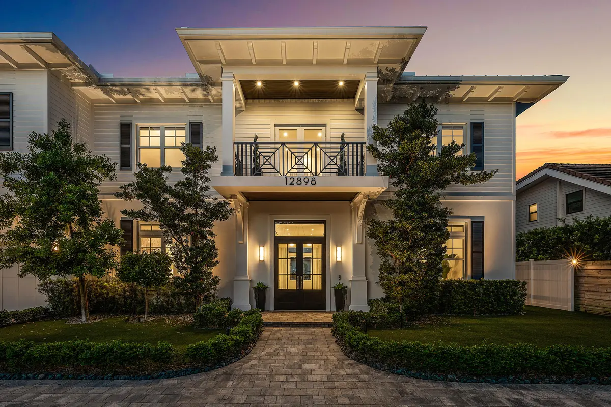 Twilight Front Entry at 12898 S Shore Drive, Palm Beach Gardens
