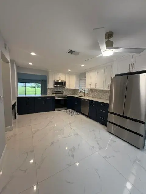 Kitchen at 2105 DEER CREEK WOODLANDS Way, Deerfield Beach