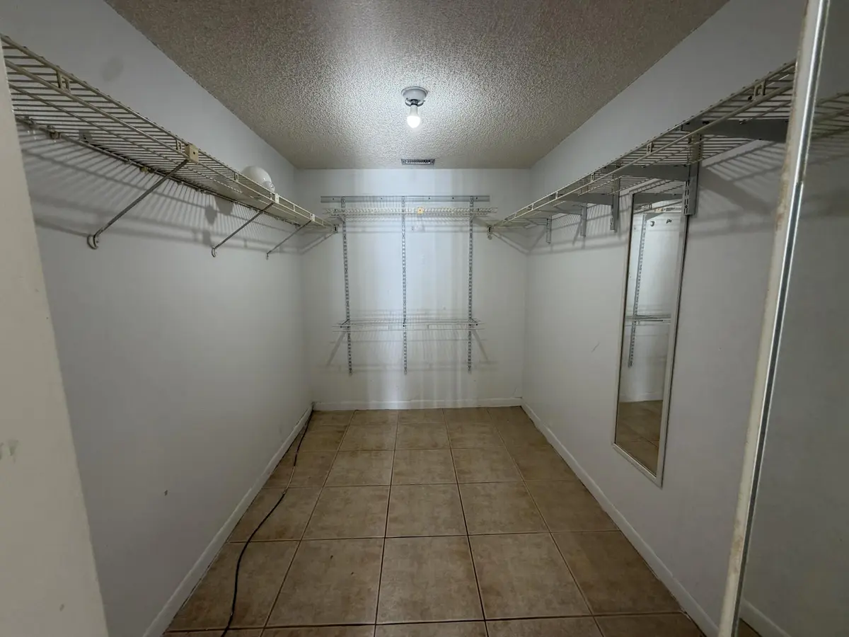 Walk In Closet at 112 LAKE EMERALD Drive 203, Oakland Park