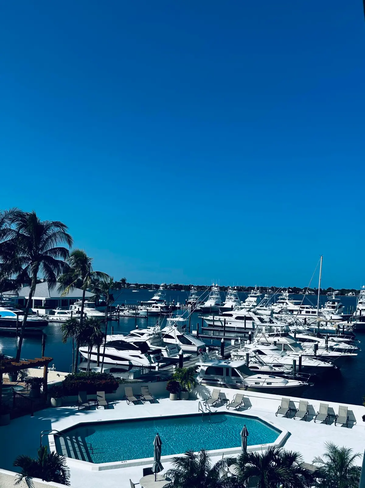 MARINA TOWER POOL/SUMMER KITCHEN VIEW at 108 Lakeshore Drive 141, North Palm Beach