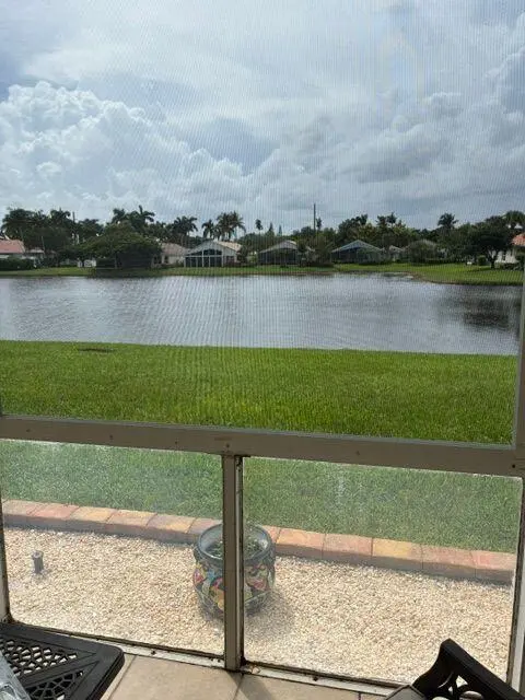 View from living room and porch at 10398 Utopia Circle, Boynton Beach