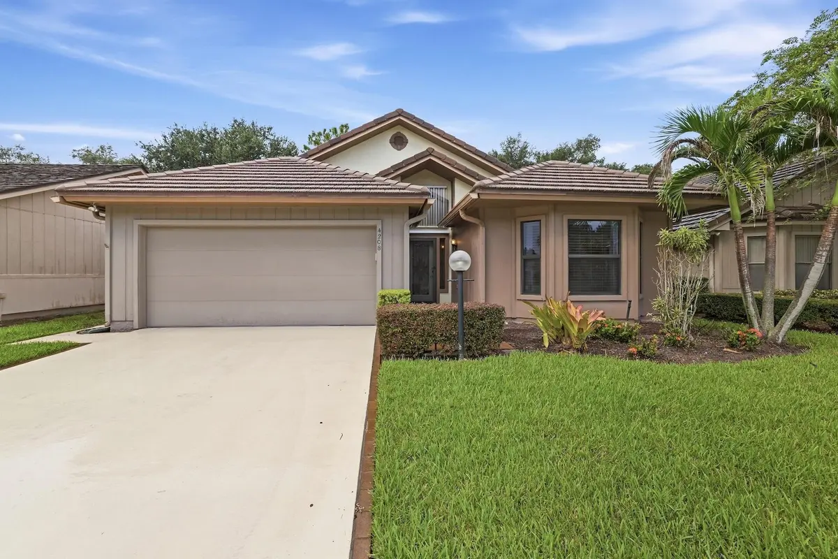 01_Front_Exterior at 4208 SW Mallard Creek Trail, Palm City