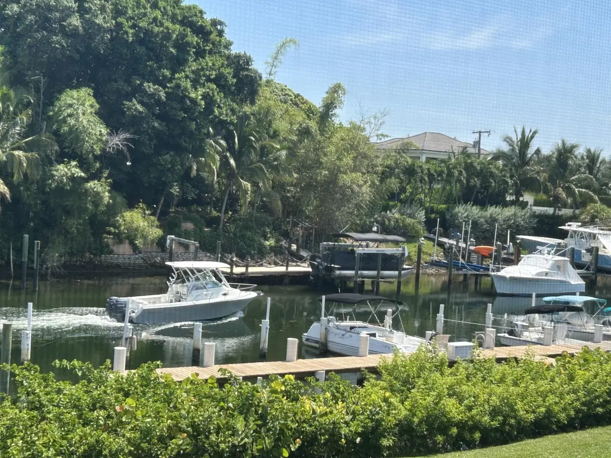 342 Southwind boat dock view at 342 Southwind Drive 203, North Palm Beach