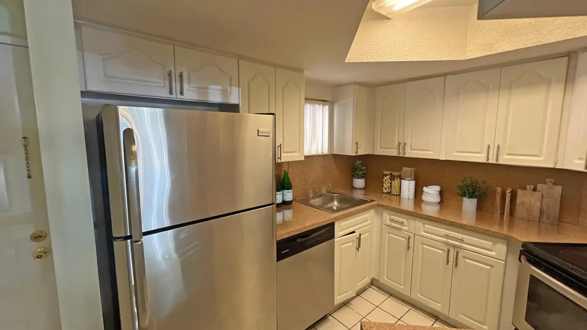 8343 Stage Kitchen at 8343 LAKE Drive 207, Doral