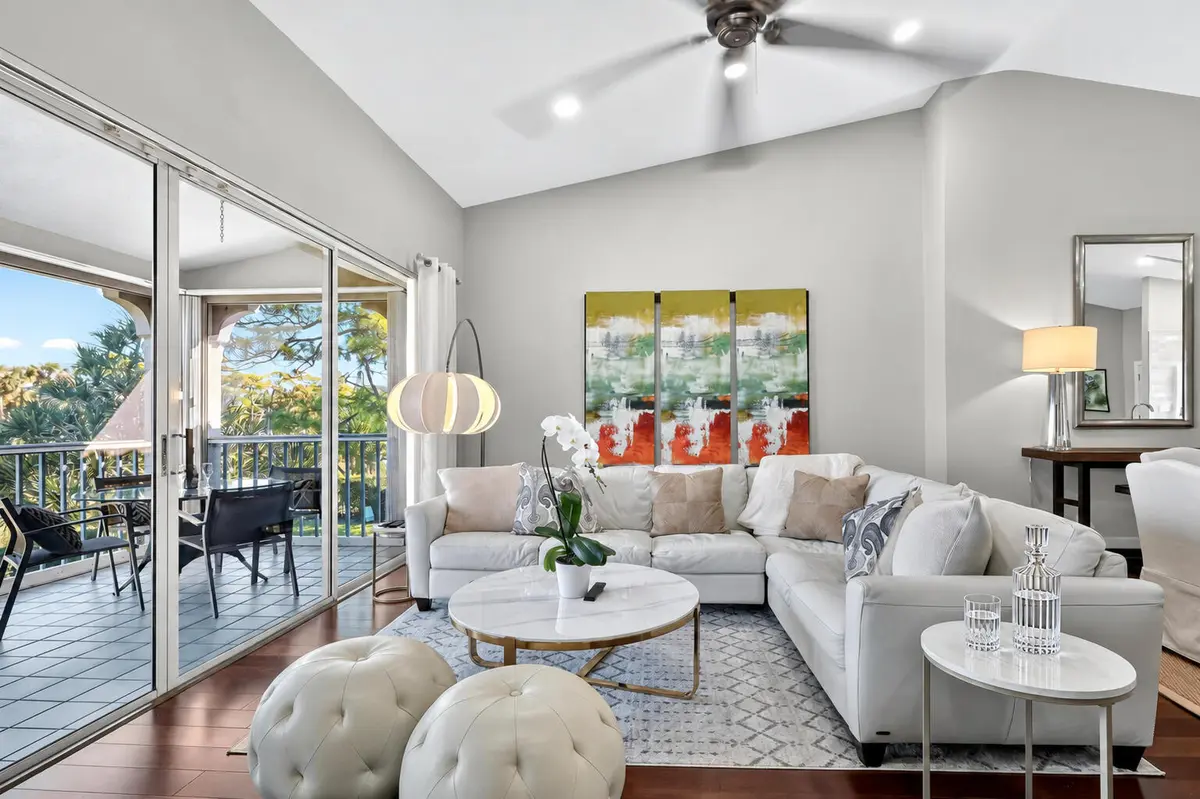 05_Living_Room_Screened_Balcony at 305 Ryder Cup Circle, Palm Beach Gardens