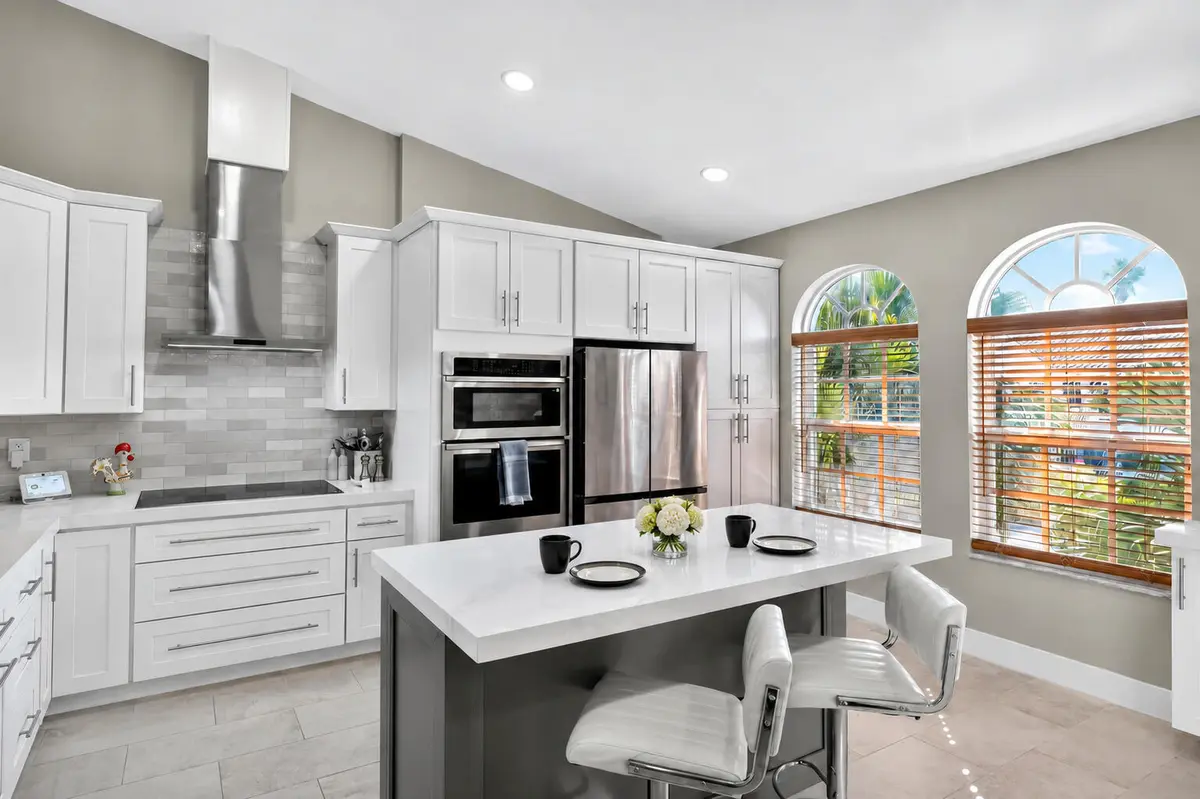07_Kitchen_Center_Island at 305 Ryder Cup Circle, Palm Beach Gardens