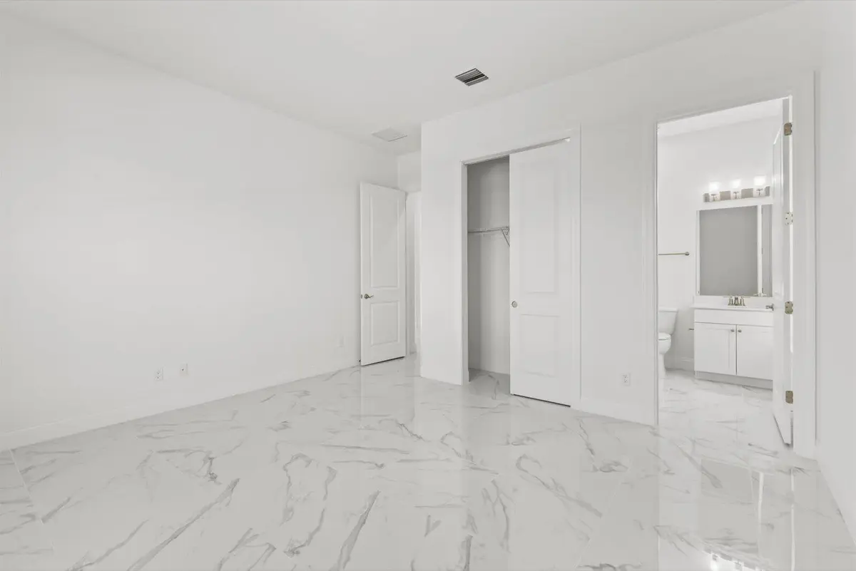 39-FrontGuestBedwBath at 10264 NW Field Flower Trail, Port St. Lucie