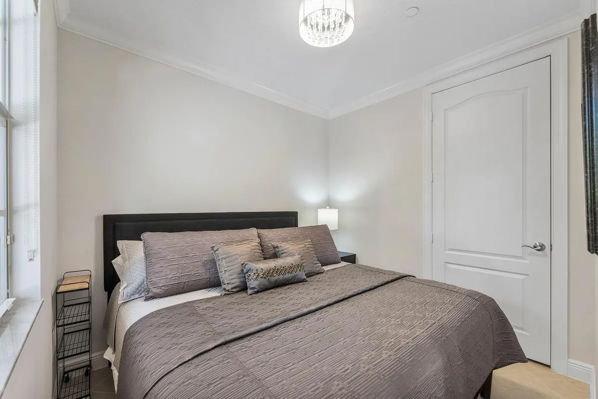 LOWER LEVEL BEDROOM at 5580 NE Trieste Way, Boca Raton