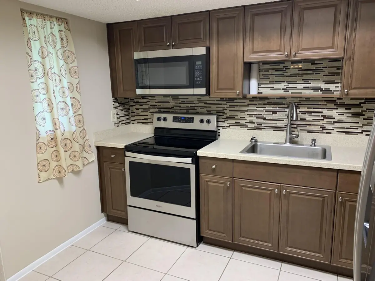 Kitchen at 1544 SE ROYAL GREEN Circle 204, Port St. Lucie