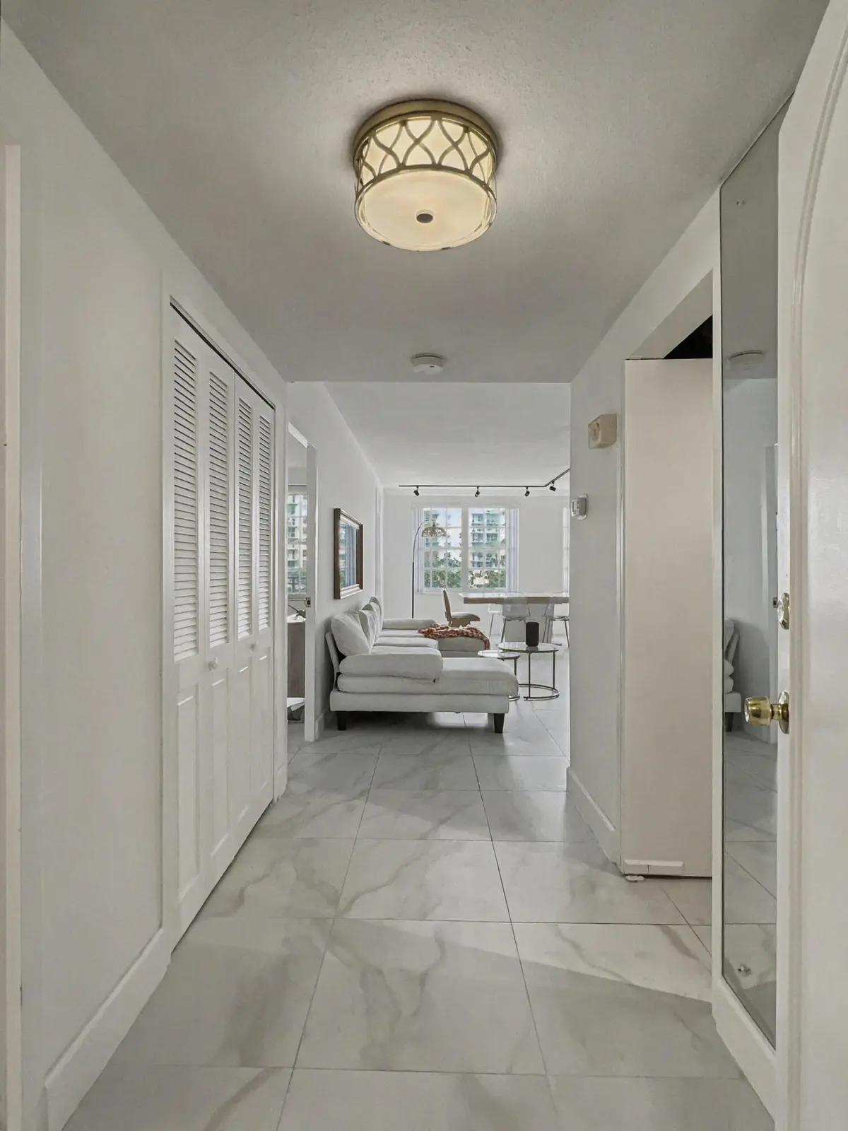 5 Foyer Portrait at 3475 S Ocean Boulevard 212, Palm Beach