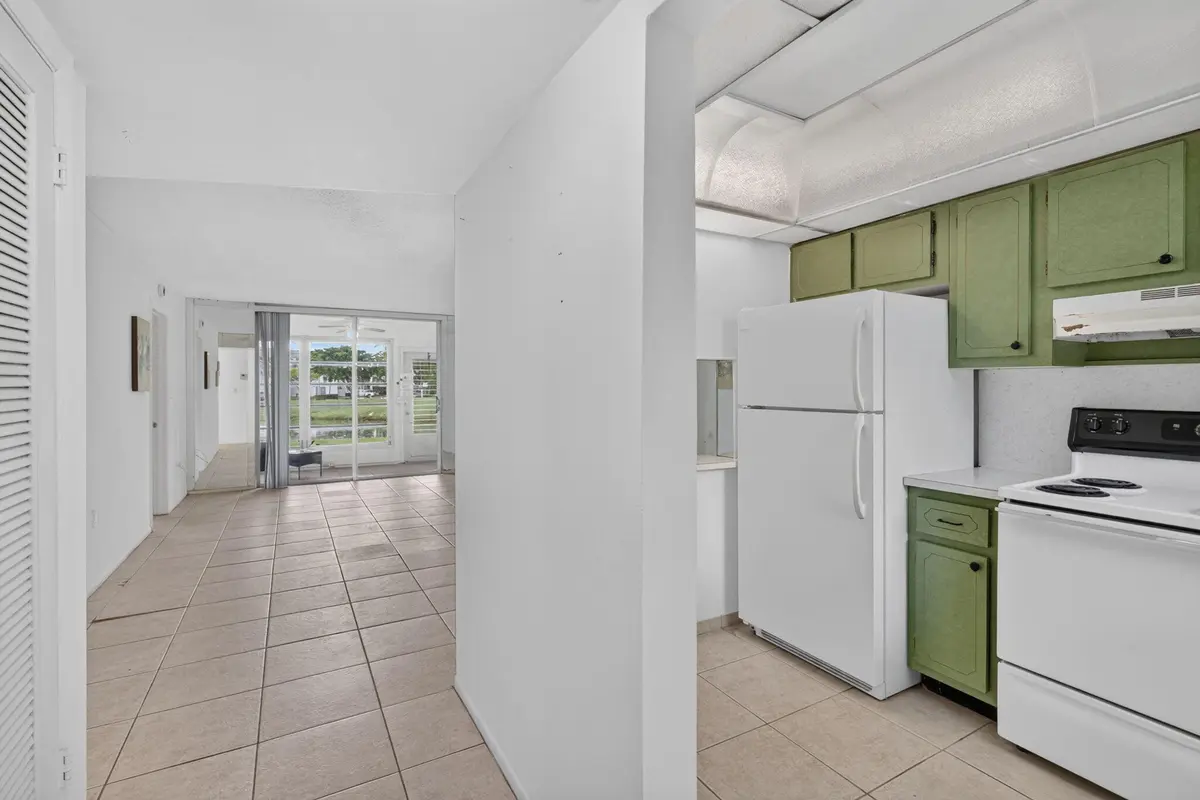 Kitchen and hall at 8100 Sunrise Lakes Boulevard 109, Sunrise