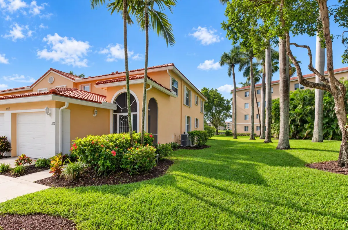 FRONT/SIDE OF HOME-END UNIT at 12467 Crystal Pointe Drive 202, Boynton Beach