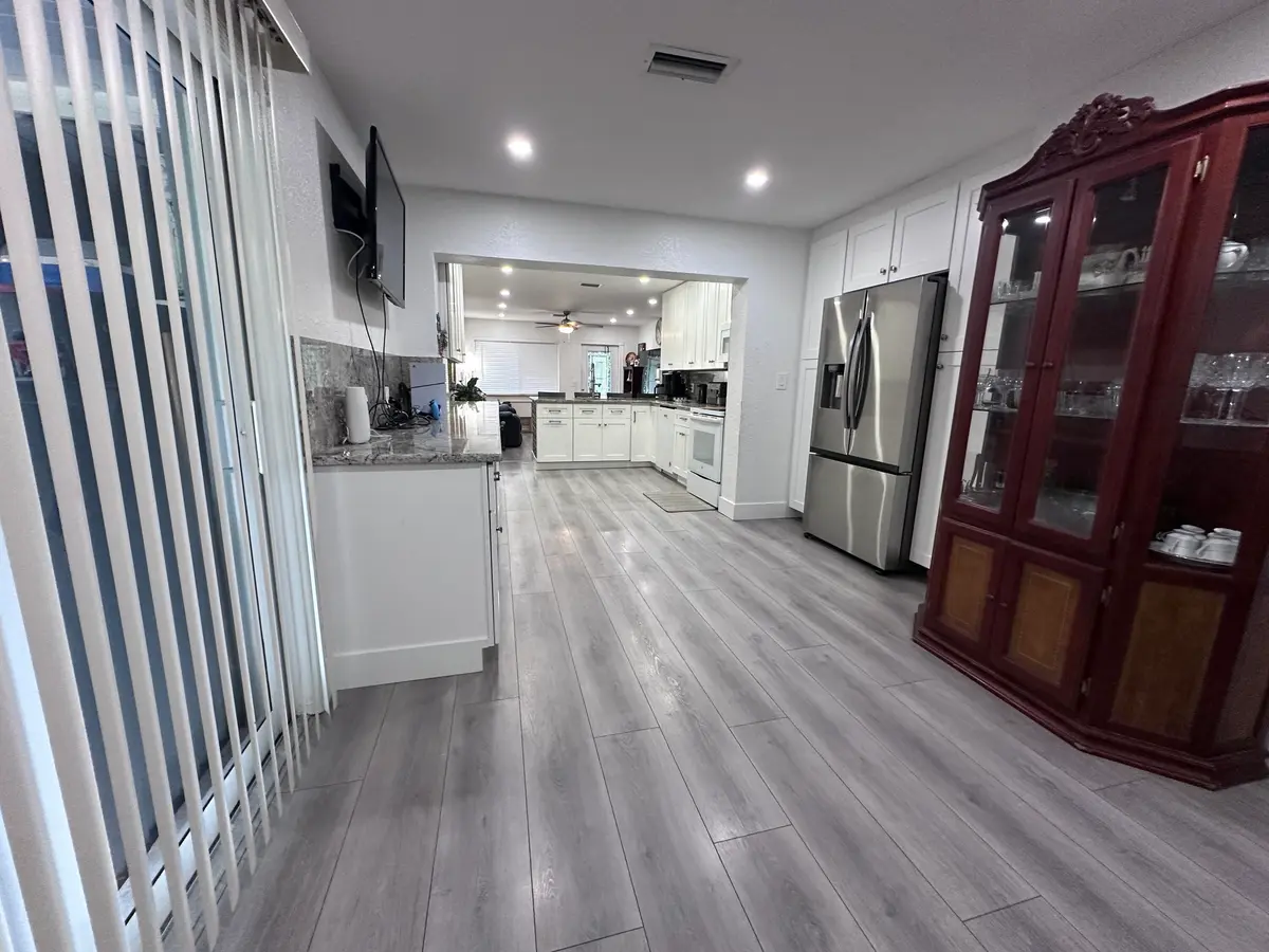from dining area with sliders to outside at 1013 N C Street, Lake Worth Beach