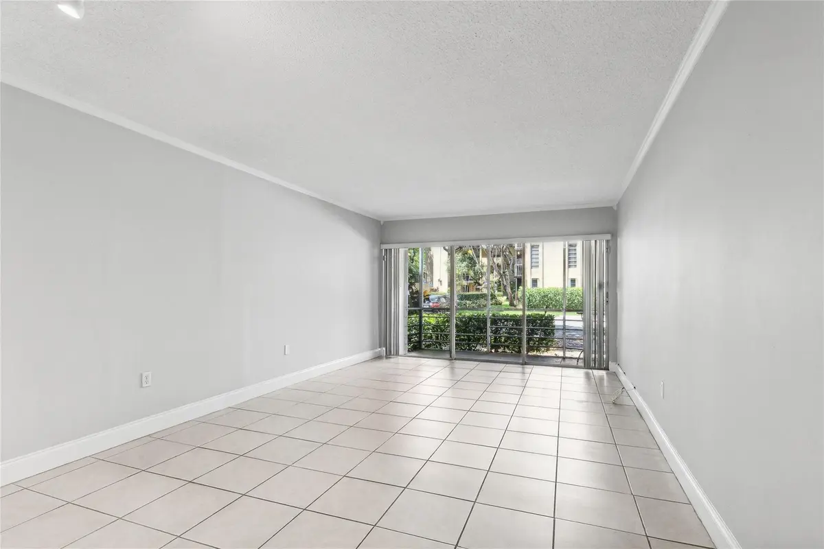 Photo 2 at 485 N Pine Island Road 105A, Plantation