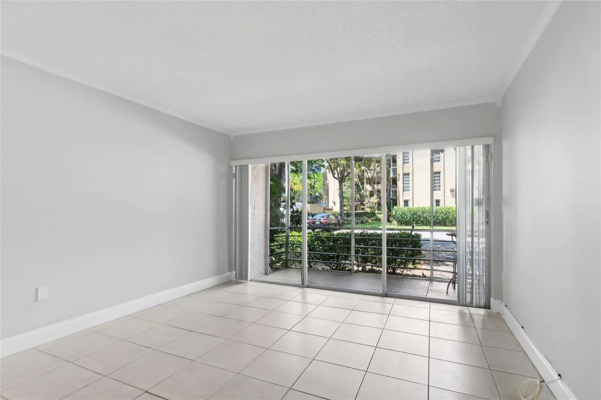 Photo 3 at 485 N Pine Island Road 105A, Plantation
