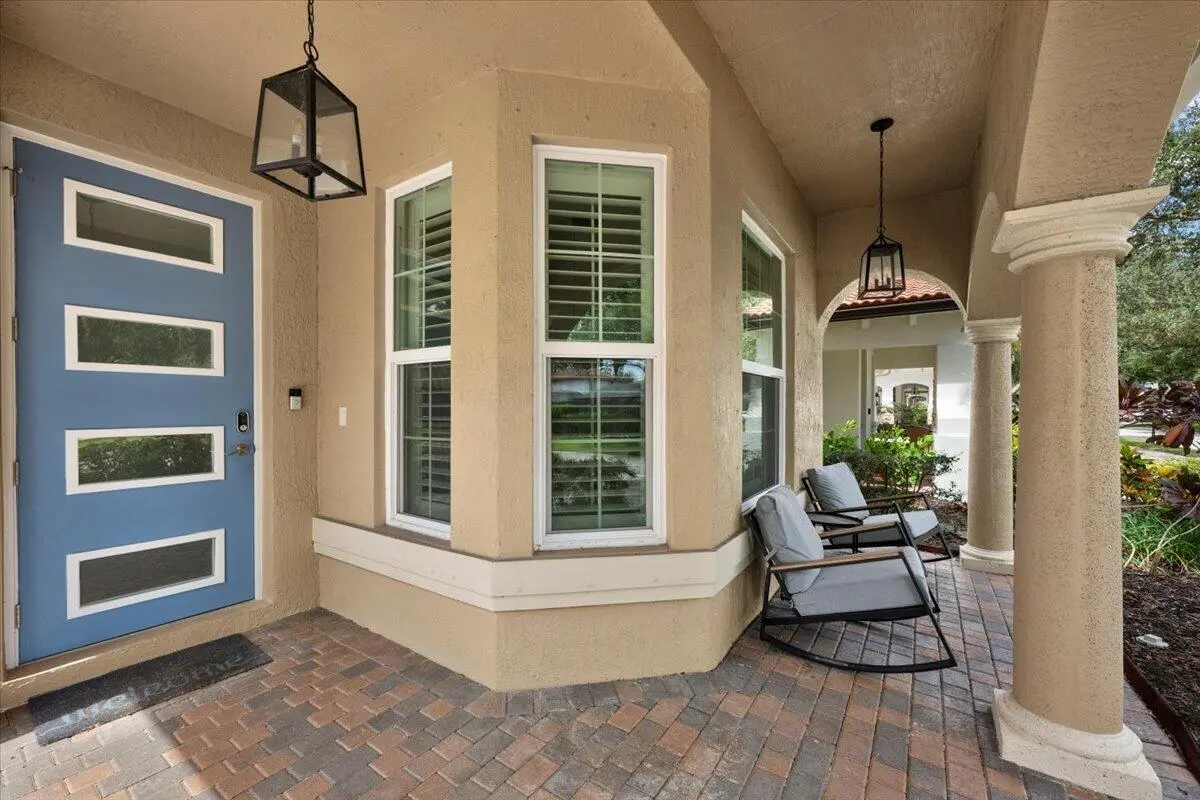 Inviting Porch Entryway at 443 Pumpkin Drive, Palm Beach Gardens