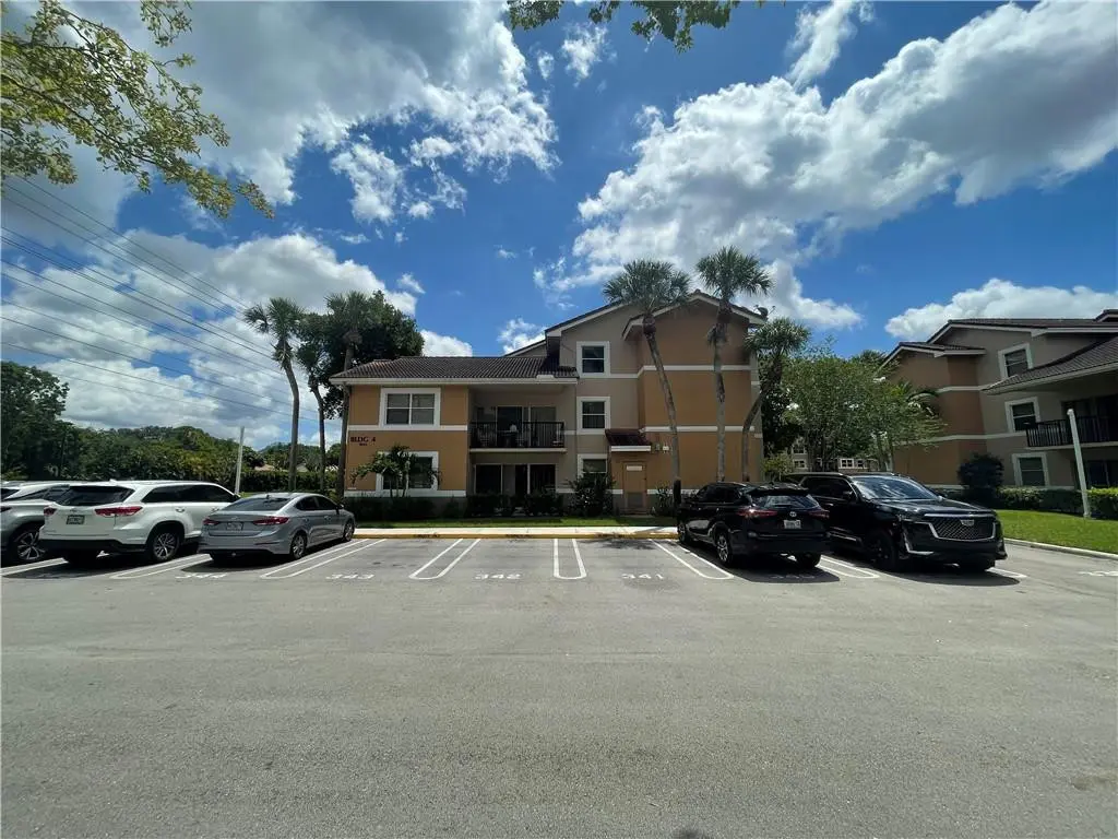 Photo 2 at 9033 WILES Road 302, Coral Springs