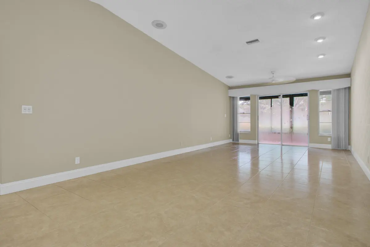 Living:dining enpty at 8864 Sunscape Lane, Boca Raton