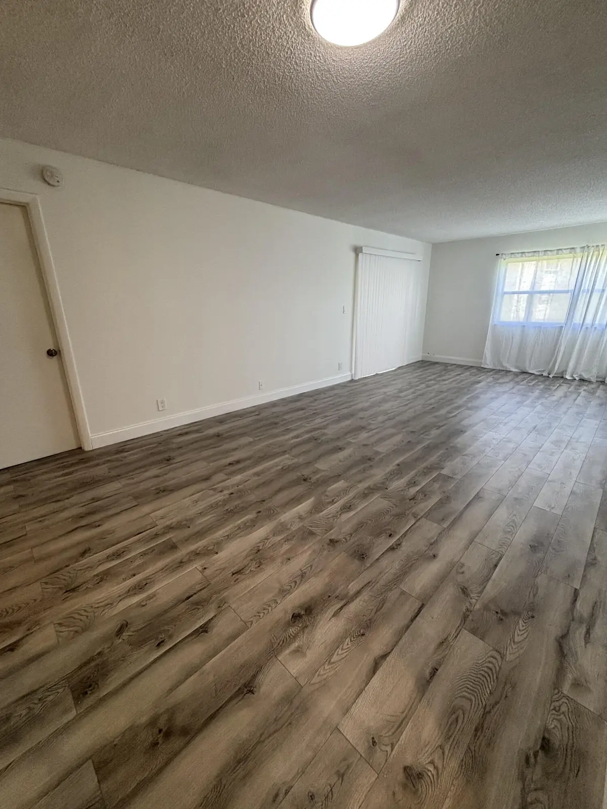 Living Room at 220 Lakeview Drive 103, Weston