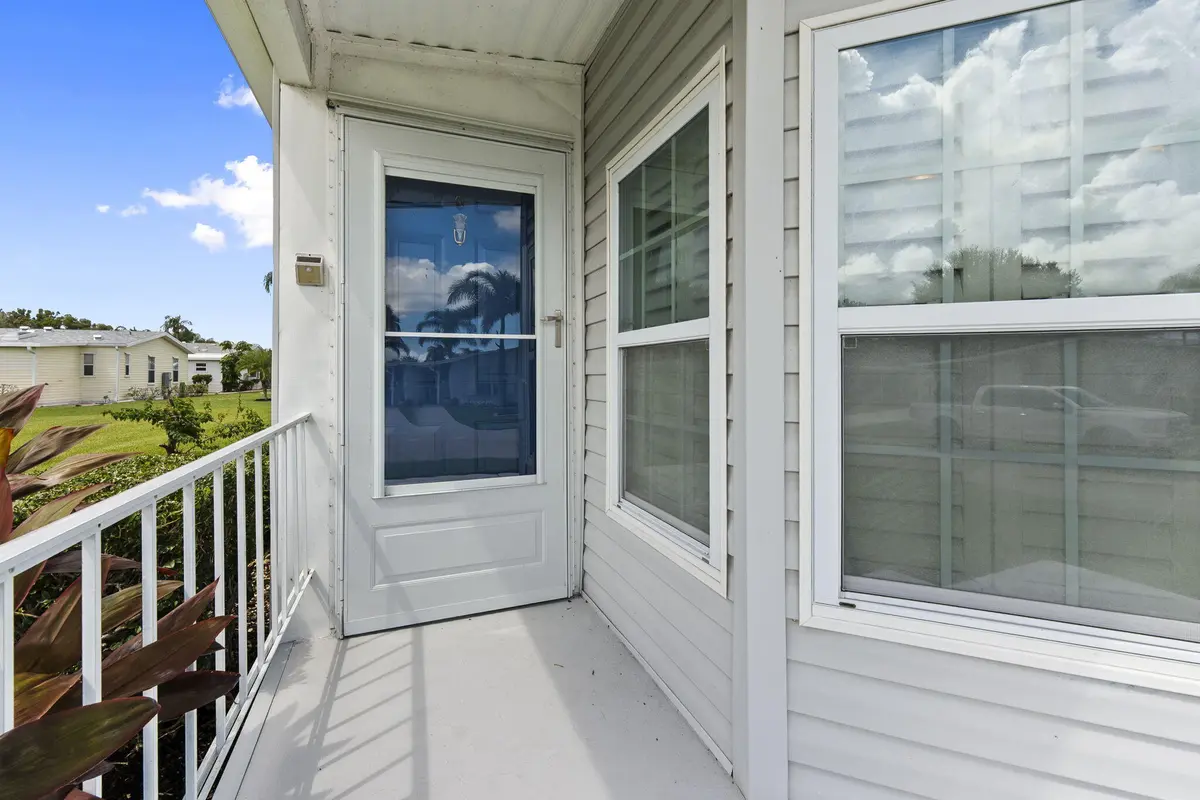 FRONT ENTRANCE - NEW STORM DOOR at 3342 COLUMBRINA Circle, Port St. Lucie