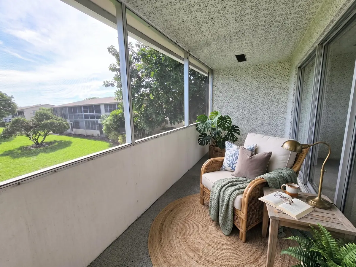 Wide screened terrace at 204 CANTERBURY I, West Palm Beach