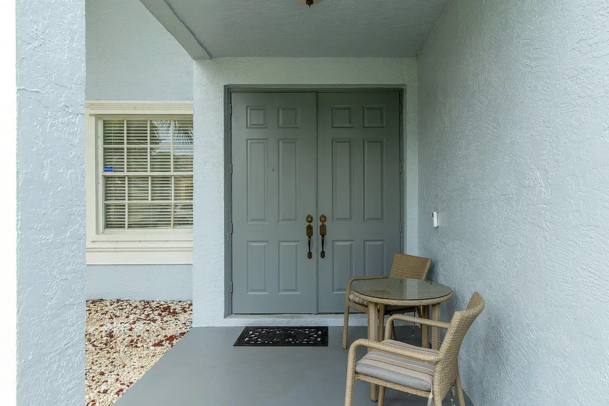 Double door entry at 9912 WOODWORTH Court, Wellington