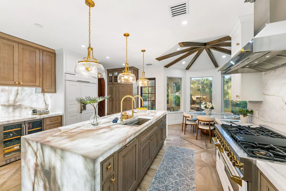 Kitchen Island and Gathering Space at 2584 SE Ranch Acres Circle, Jupiter