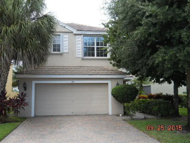 front at 147 Kensington Way, Royal Palm Beach