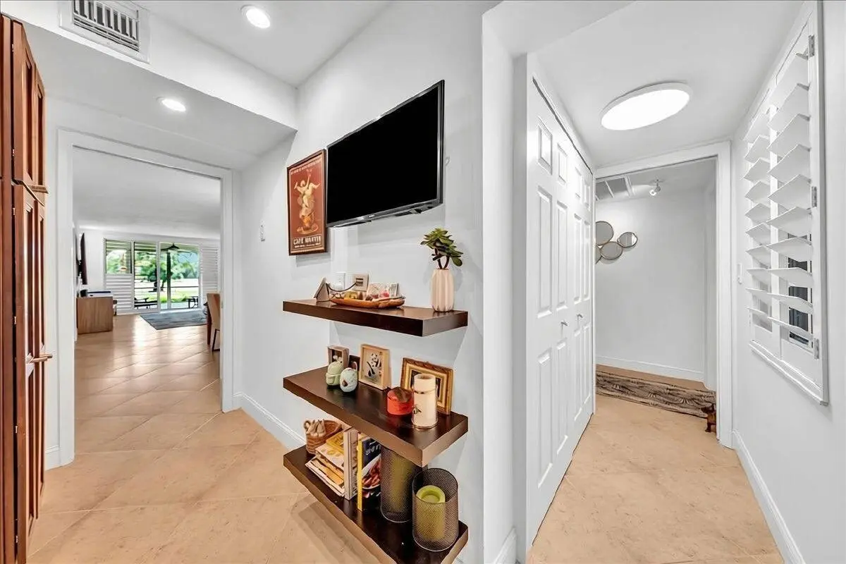 View of Laundry Closet, Front Door, an at 3505 Oaks Way 109, Pompano Beach