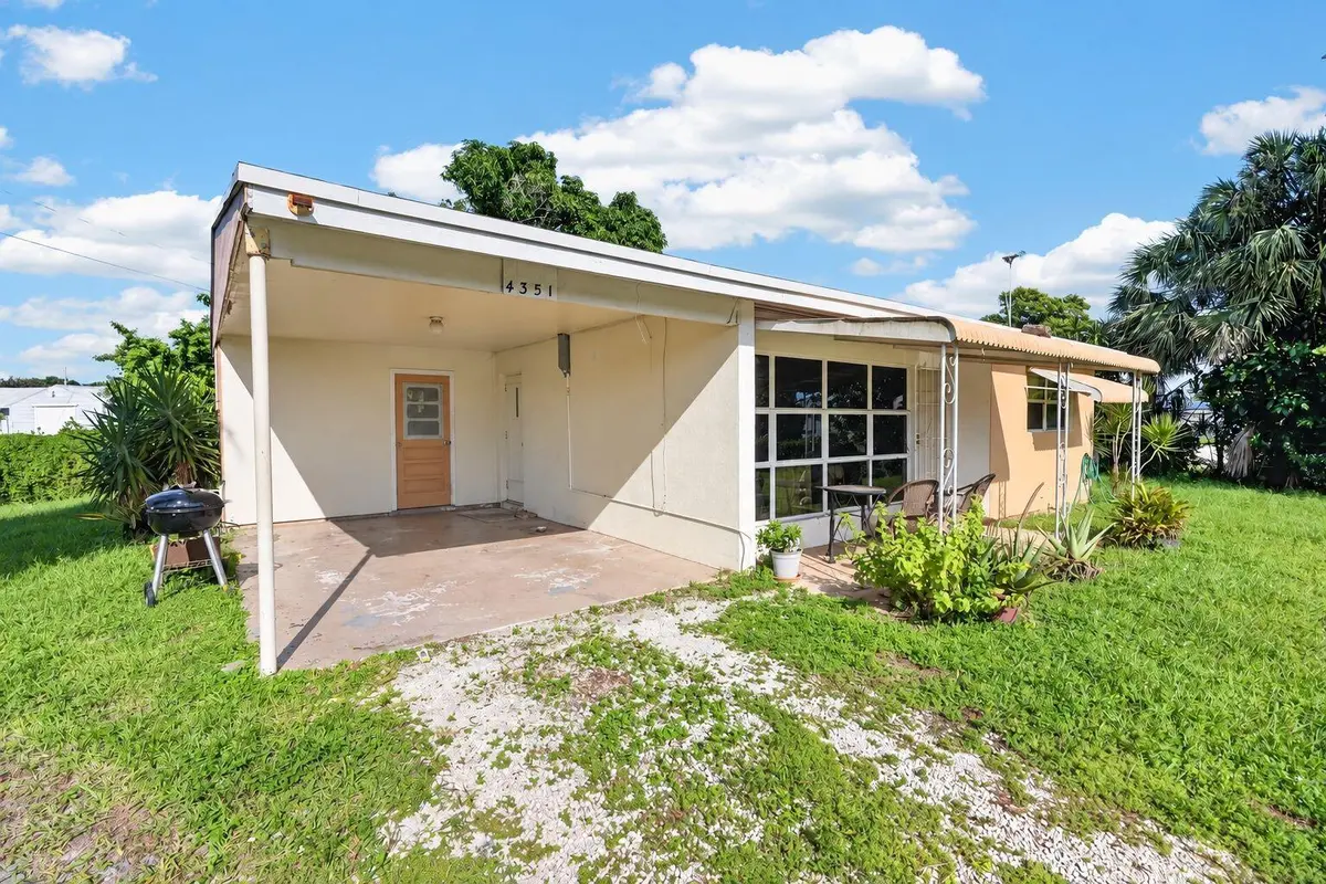 carport view at 4351 Colt Lane, West Palm Beach