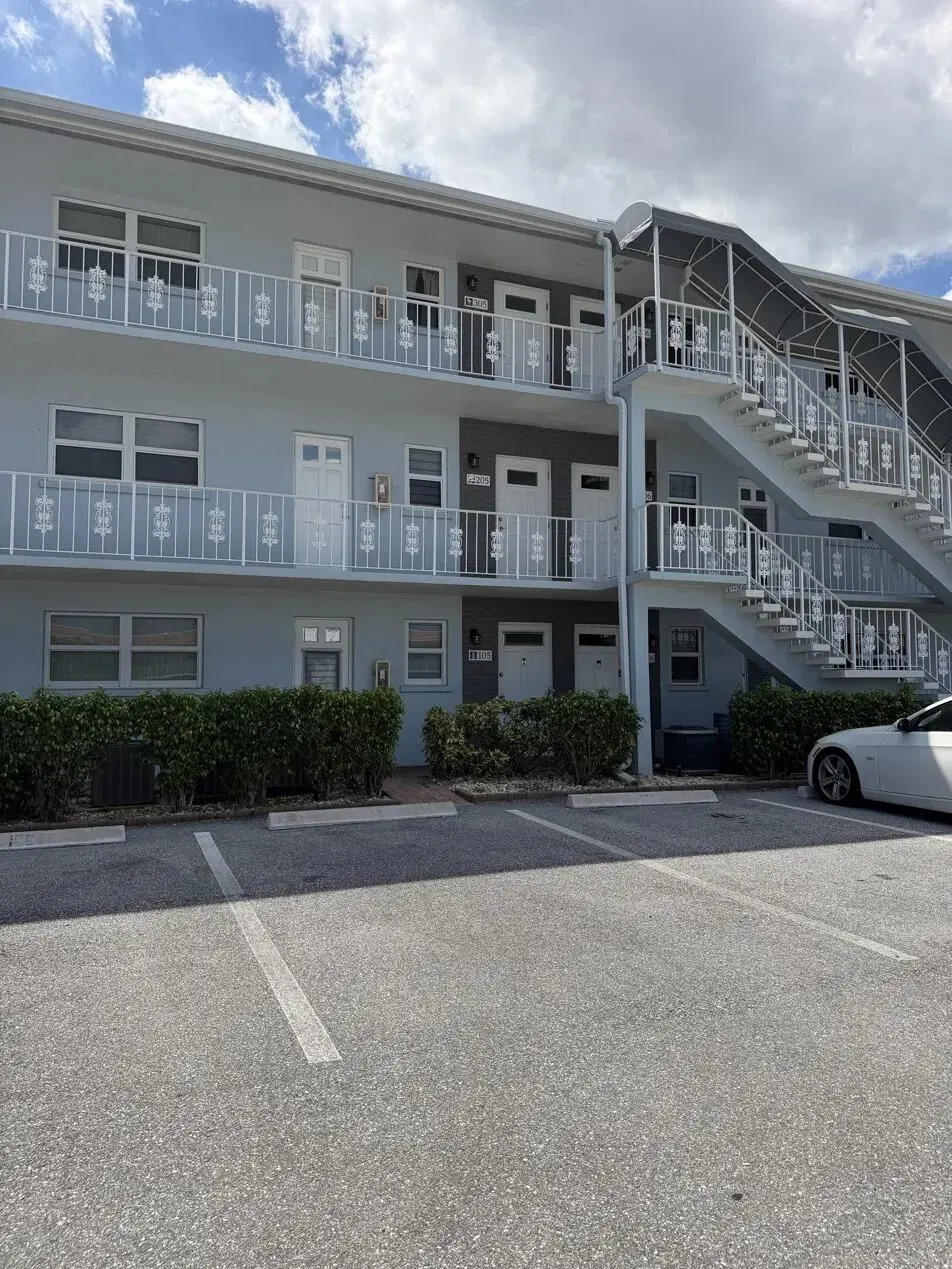 Front Ext 1 at 120 LEHANE Terrace 105, North Palm Beach