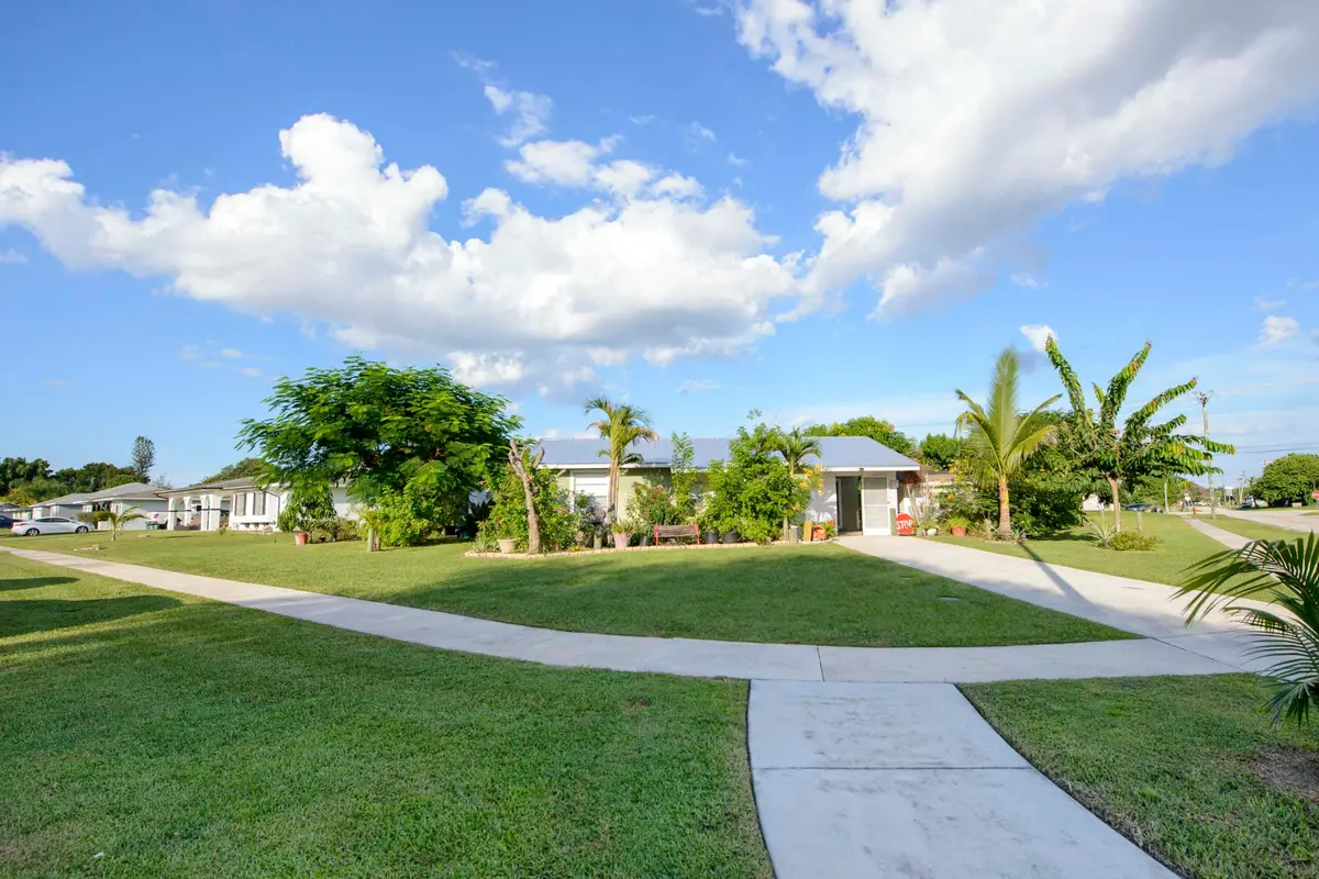 01- Front (1) at 221 SW CALMOSO Drive, Port St. Lucie