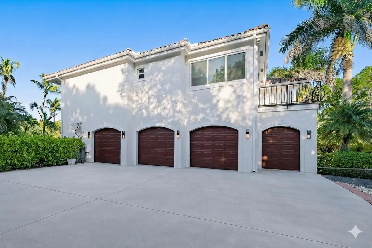3 1/2 car garage attached to home at 2584 SE Ranch Acres Circle, Jupiter