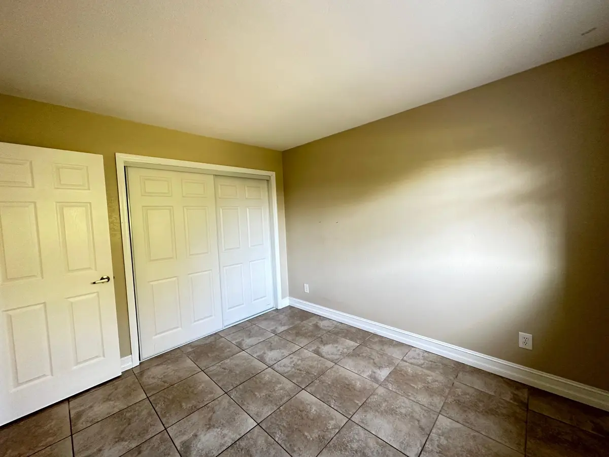 Second bedroom 5 at 3 SW HIDEAWAY Place 15, Stuart